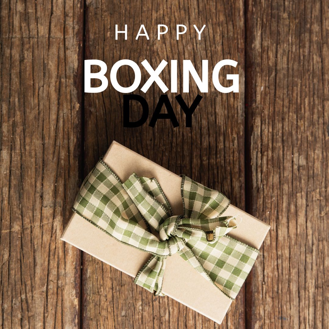 Happy Boxing Day Greeting with Gift on Rustic Table