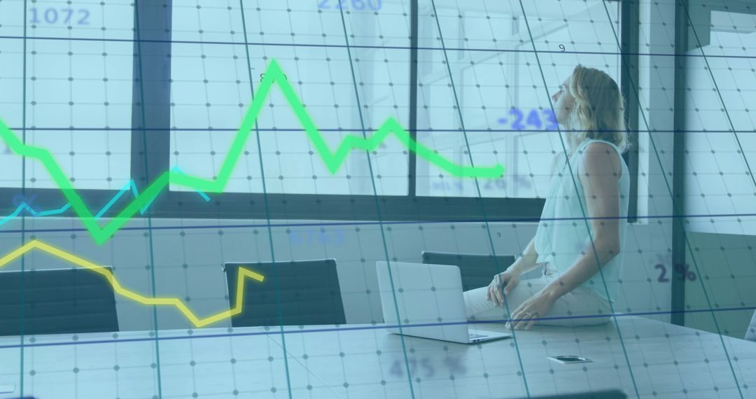 Businesswoman Analyzing Digital Trends in Modern Office Interface