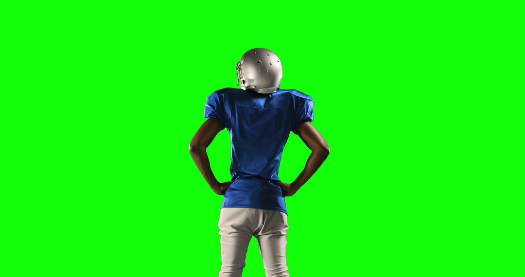 Football Player Standing Confidently in Uniform on Green Screen Background - Free Images, Stock Photos and Pictures on Pikwizard.com