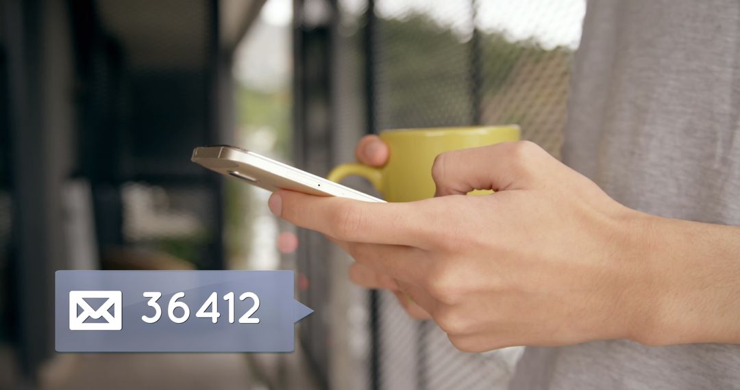 Person Holding Coffee Cup Checking High Email Inbox Notifications