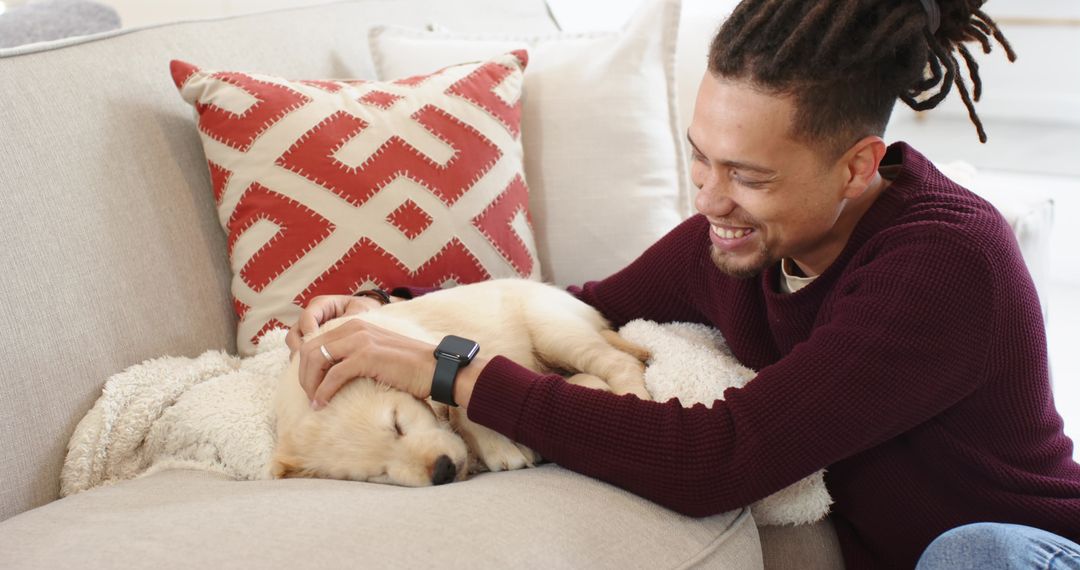 Man Petting Sleeping Puppy on Sofa Creating Cozy Relaxing Home Moment