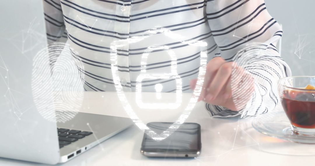 Man Interacting with Digital Security Interface on Laptop