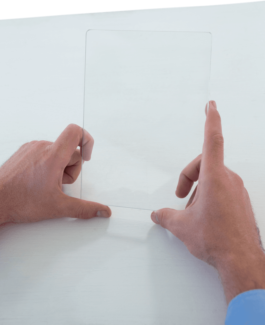 Businessman holding futuristic transparent glass tablet interface desk