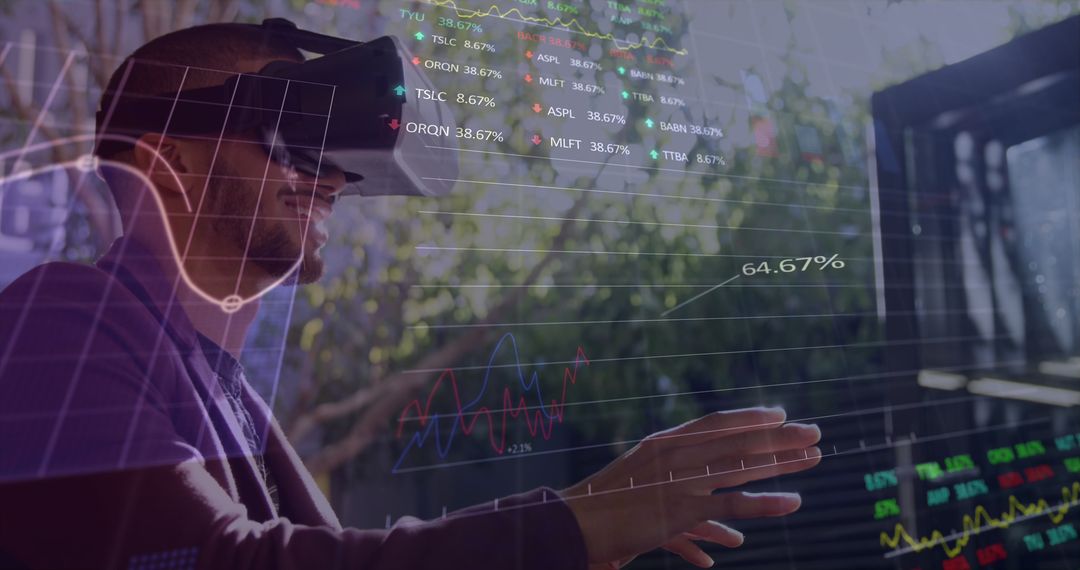 Man Using VR to Interact with Financial Data Visualization - Free Images, Stock Photos and Pictures on Pikwizard.com