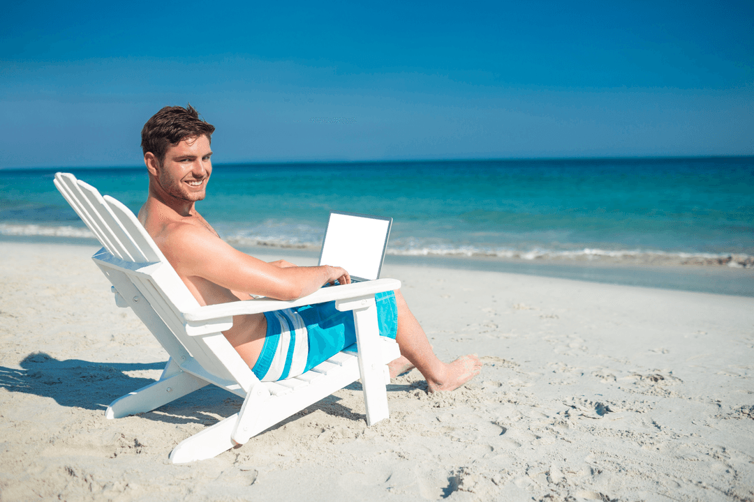 Transparent Laptop on Beach with Man Relaxing in Sun