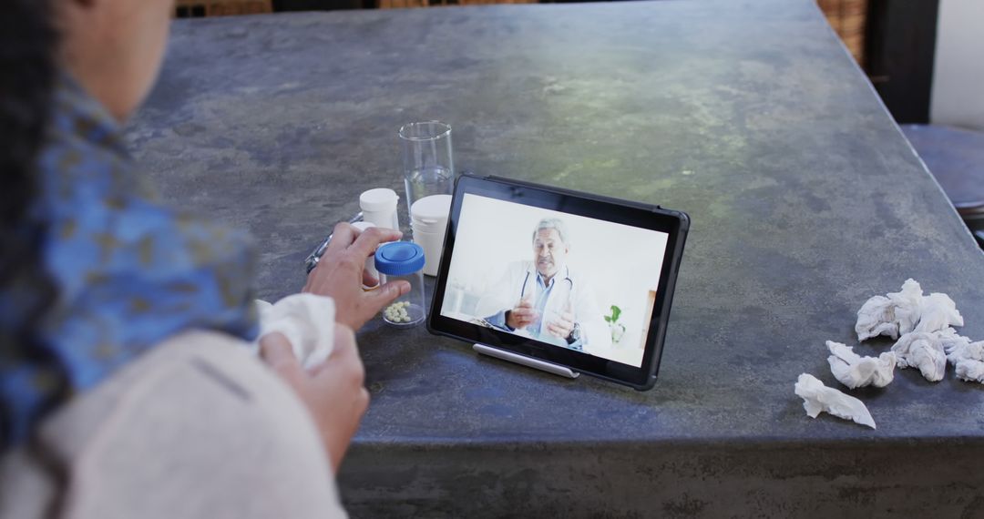 Patient Having Online Consultation with Doctor via Tablet - Free Images, Stock Photos and Pictures on Pikwizard.com