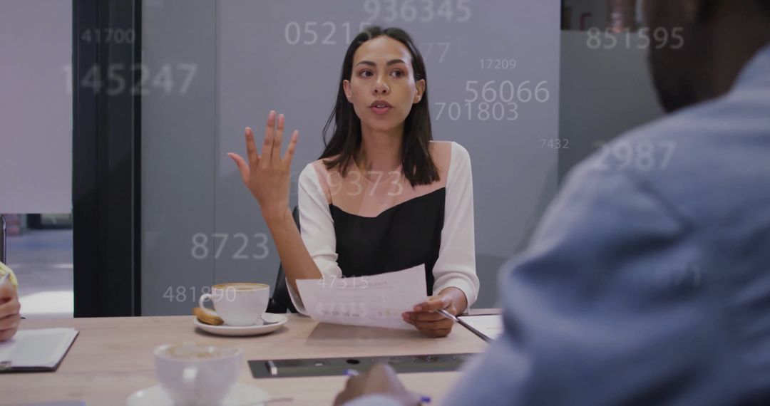 Diverse Business Team Collaborating on Data Processing