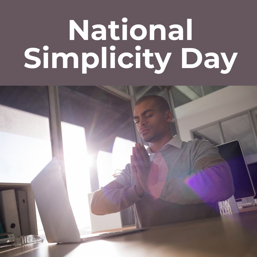 Businessman Meditating at Office Desk for National Simplicity Day