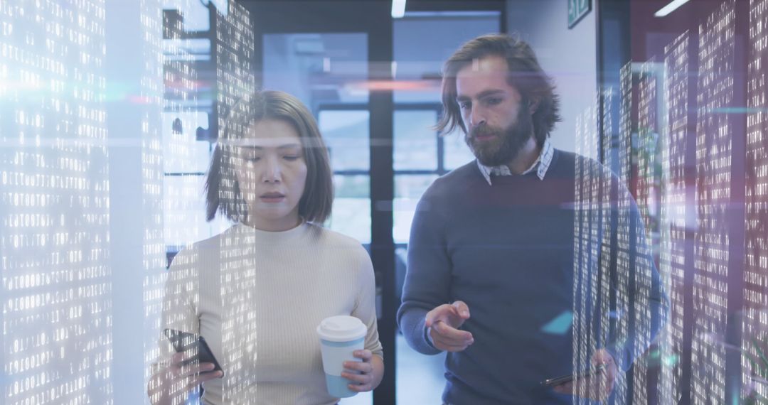 Professionals Analyzing Data with Holographic Interface