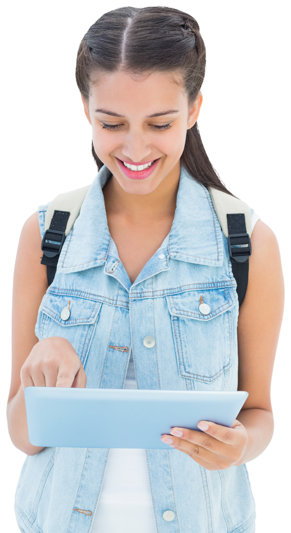 Smiling Girl Using Tablet in Stylish Denim Vest, Transparent Background - Download Free Stock Images Pikwizard.com