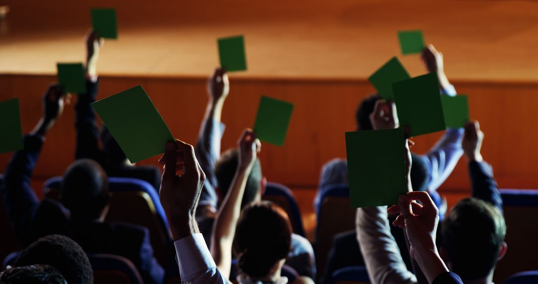 People Voting with Green Cards in Meeting or Conference Room - Free Images, Stock Photos and Pictures on Pikwizard.com