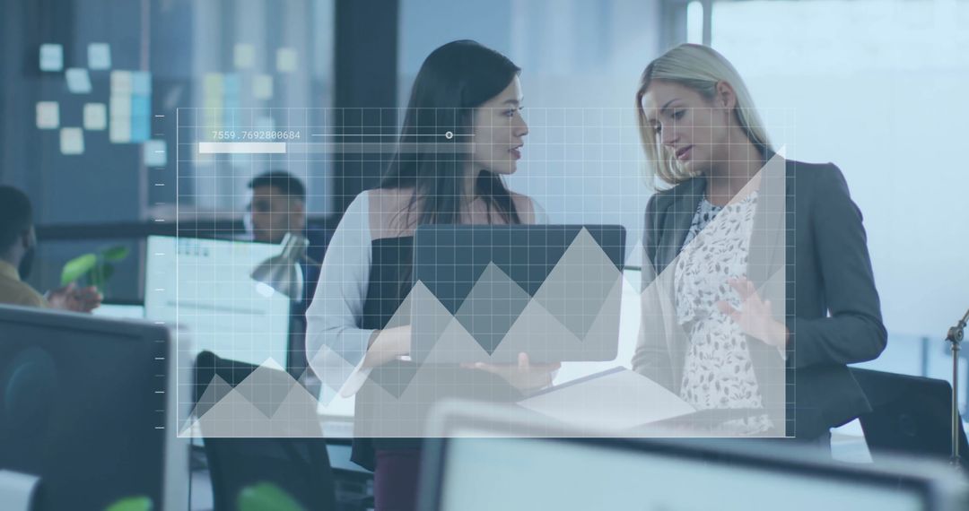 Colleagues Analyzing Financial Data with Digital Overlay in Modern Office