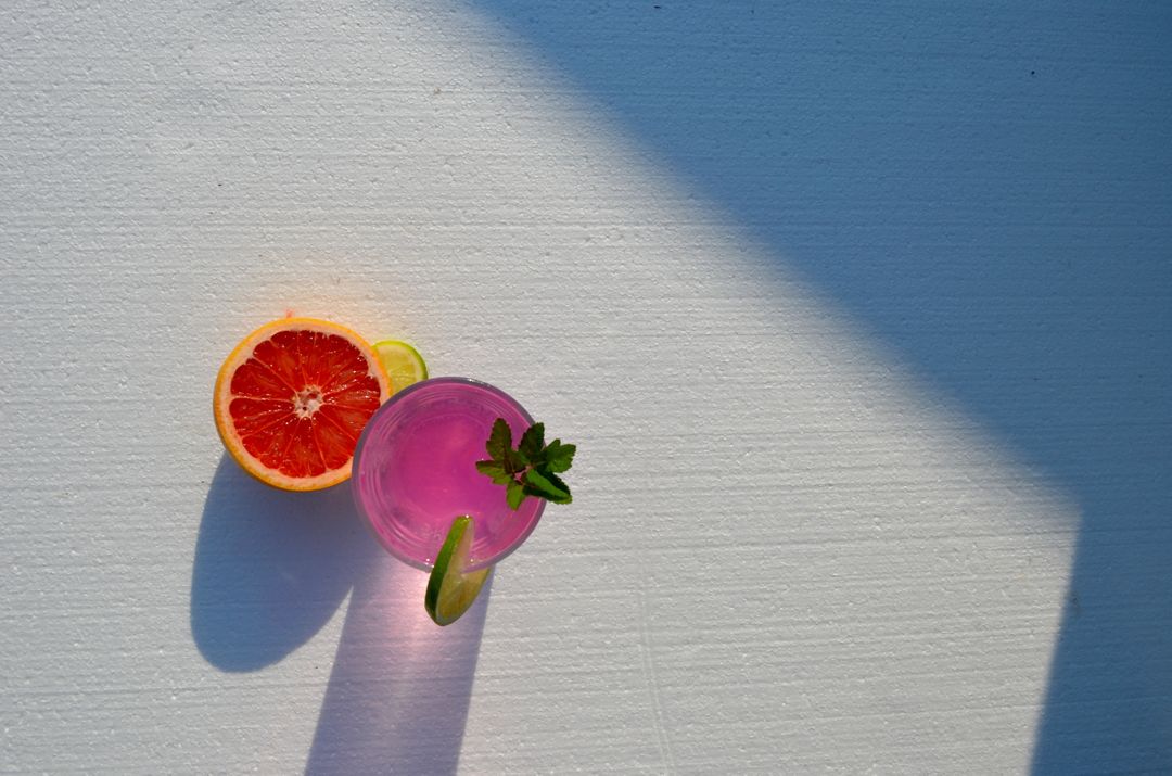 Refreshing Summer Citrus Cocktail with Red Grapefruit and Lime - Free Images, Stock Photos and Pictures on Pikwizard.com