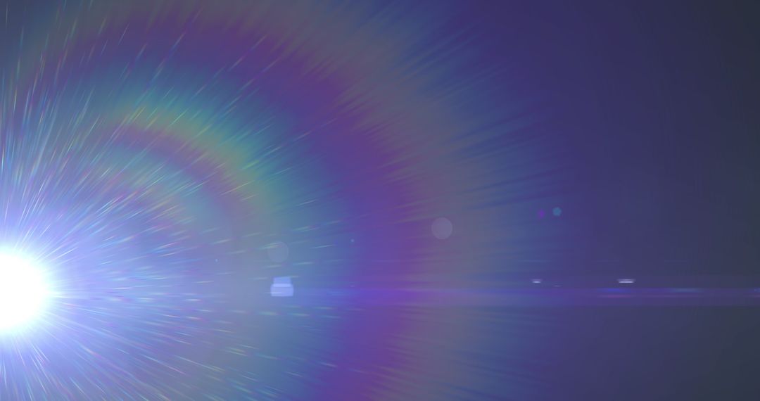 Vibrant Light Trails and Lens Flares on Dark Background