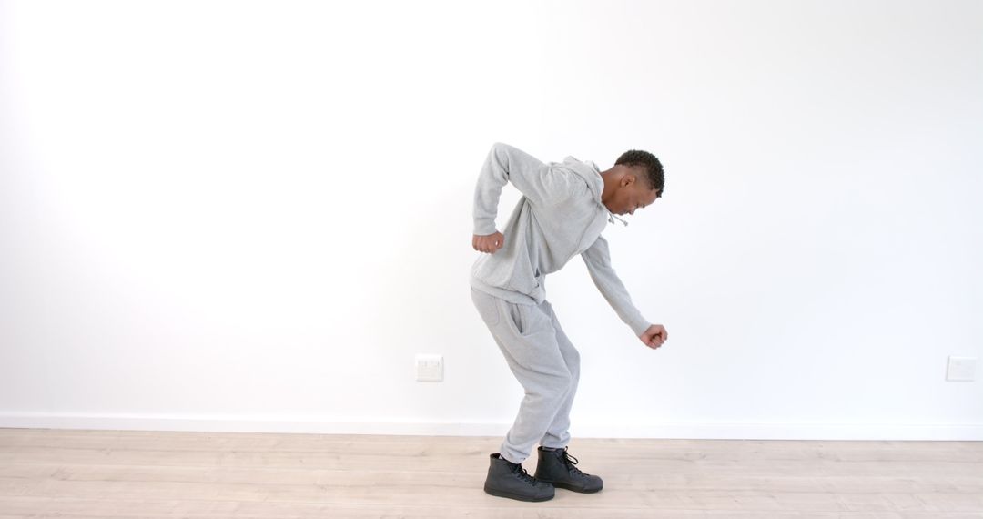 Energetic Dance Performance in Minimalist Room