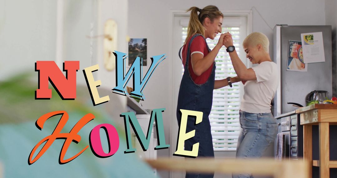 Happy Lesbian Couple Dancing in New Home