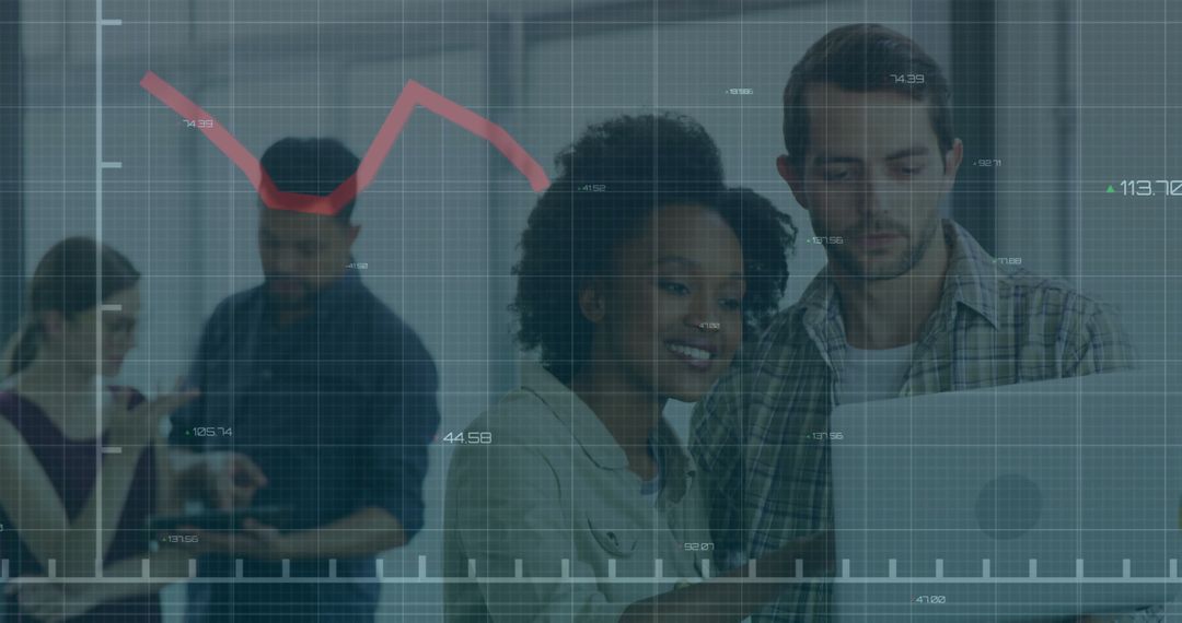 Colleagues Analyzing Financial Data on Digital Interface in Office