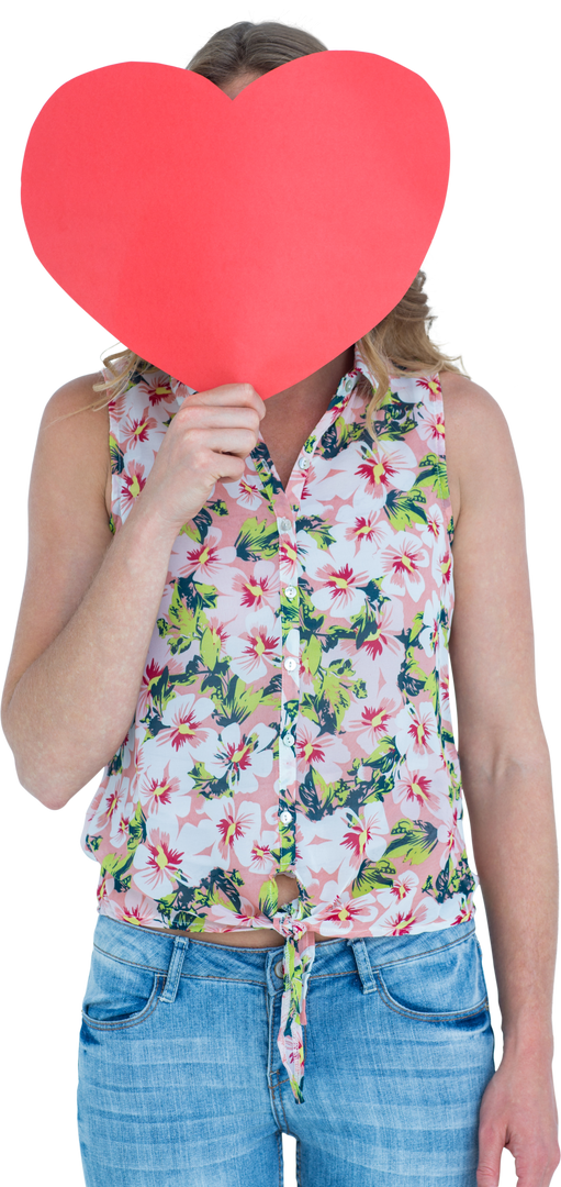 Woman holding up large red heart-shaped card against white background, showing flowers shirt - Download Free Stock Images Pikwizard.com