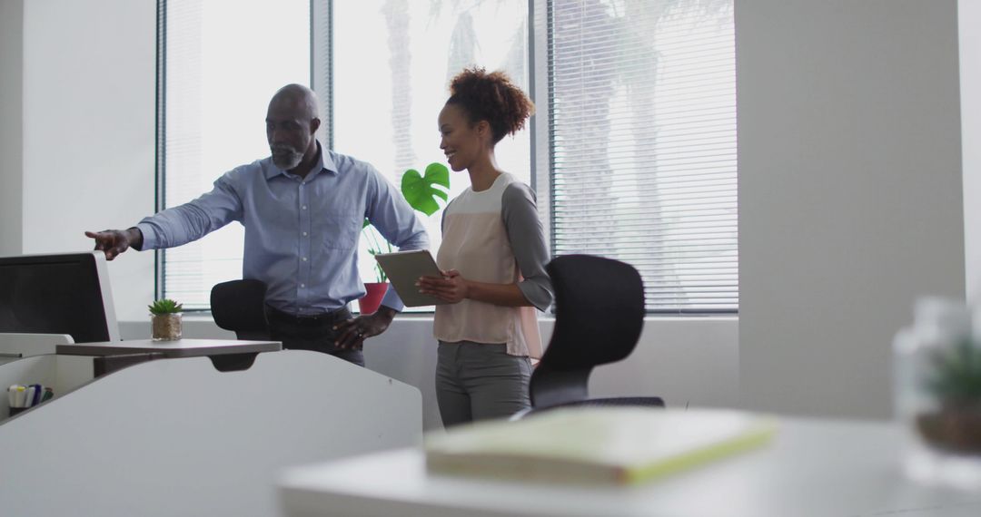 Business Colleagues Collaborating in a Modern Office Space