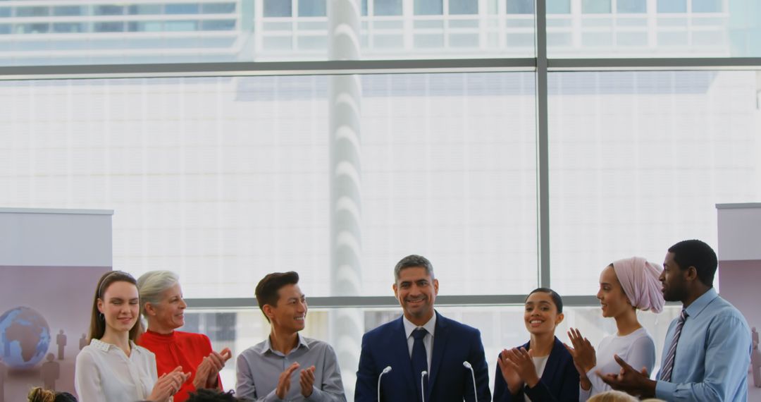 Diverse Business Team Applauding Leader at Seminar
