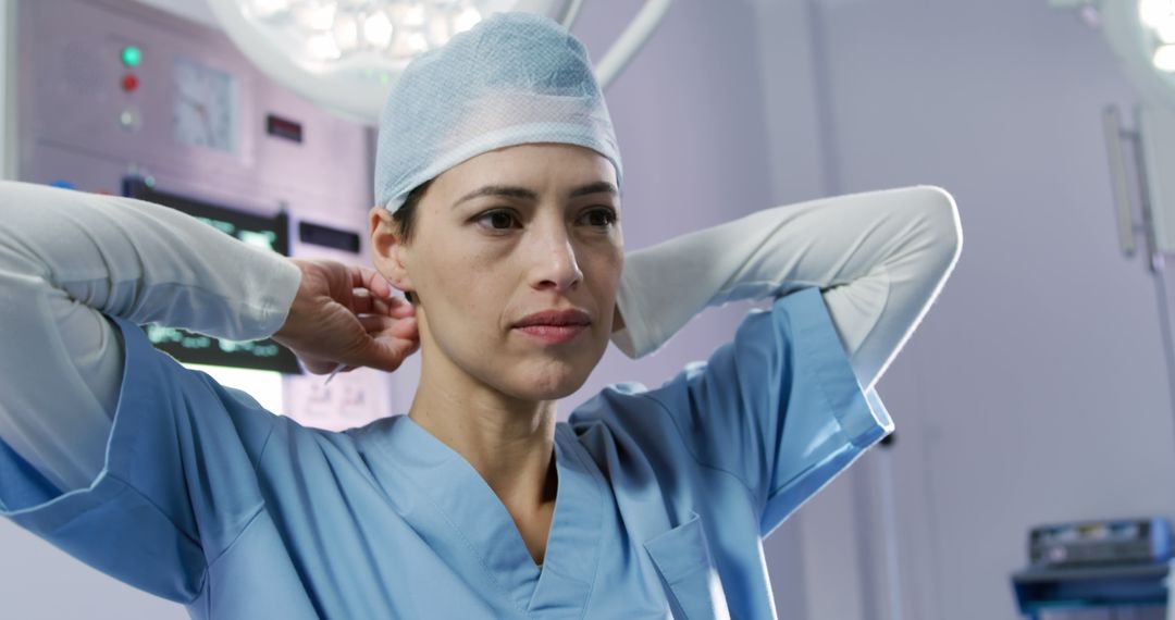 Female Surgeon Preparing for Surgery Before Entering Operation Room - Free Images, Stock Photos and Pictures on Pikwizard.com