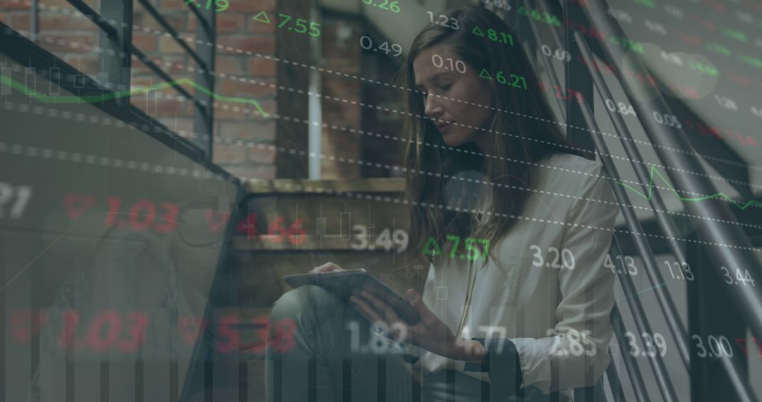 Woman Analyzing Financial Data on Tablet with Stock Market Graph Overlay - Free Images, Stock Photos and Pictures on Pikwizard.com