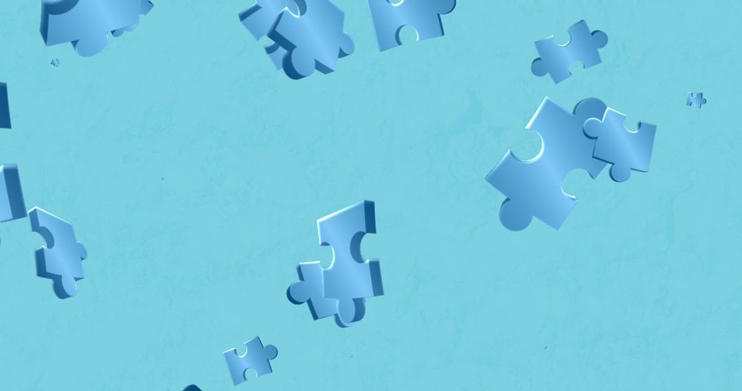 Floating Blue Puzzle Pieces on Light Blue Background