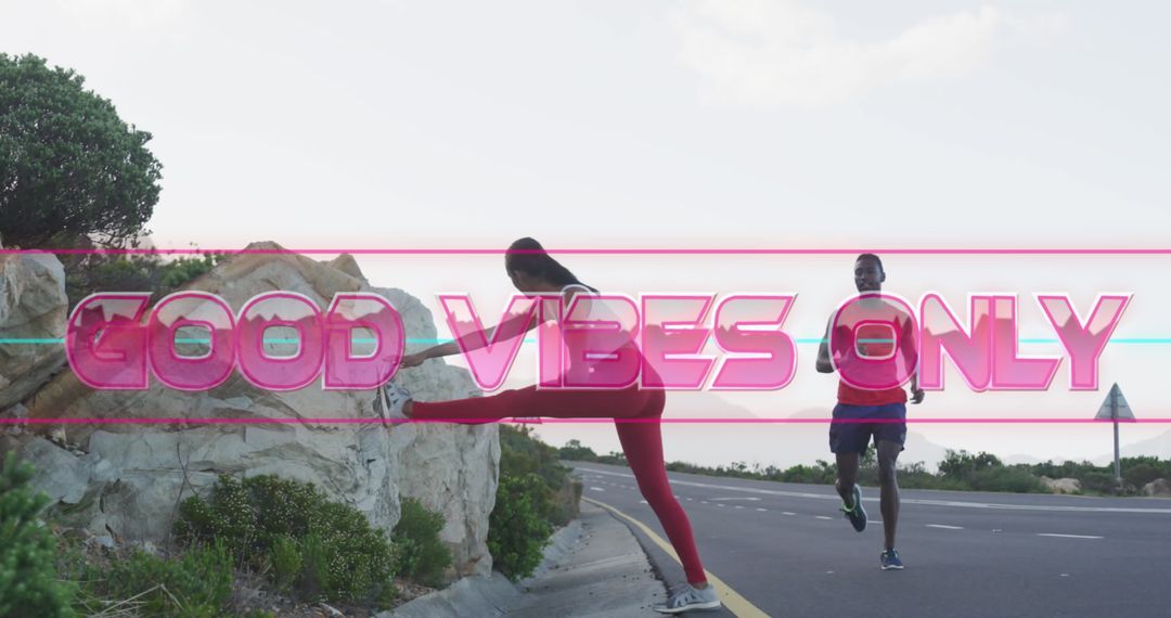 Couple Exercising on Scenic Mountain Road with Inspiring Message Overlay