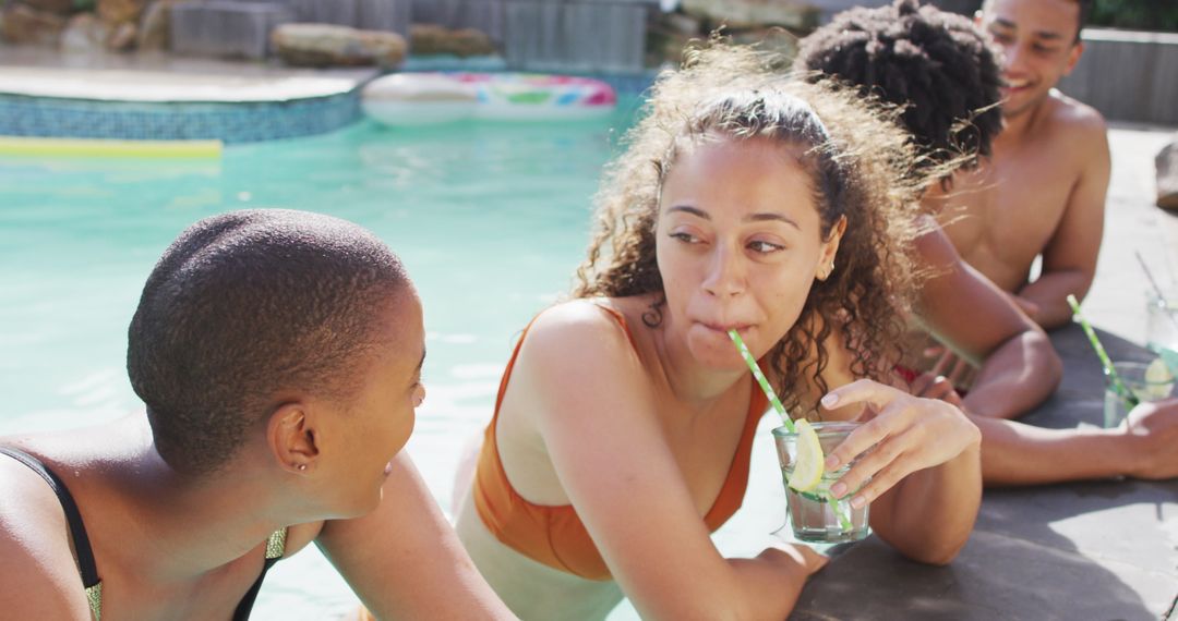 Friends Enjoying Poolside Moments at a Vibrant Pool Party