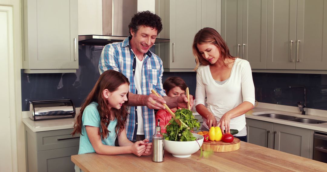 Family Preparing Meal Together in Modern Kitchen - Free Images, Stock Photos and Pictures on Pikwizard.com