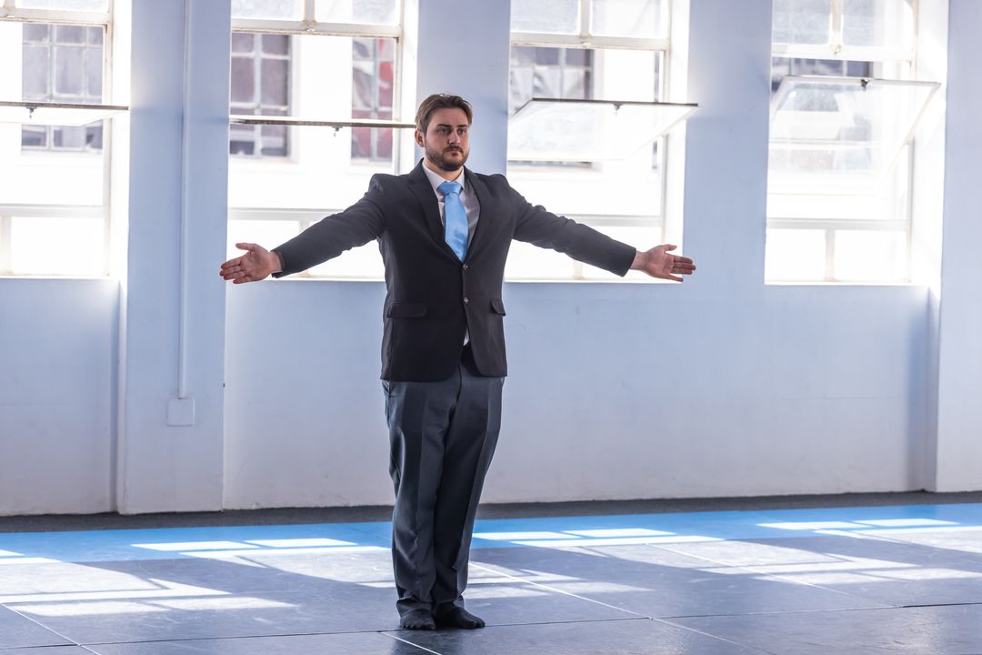 Businessman Engaging in Workout in Martial Arts Studio