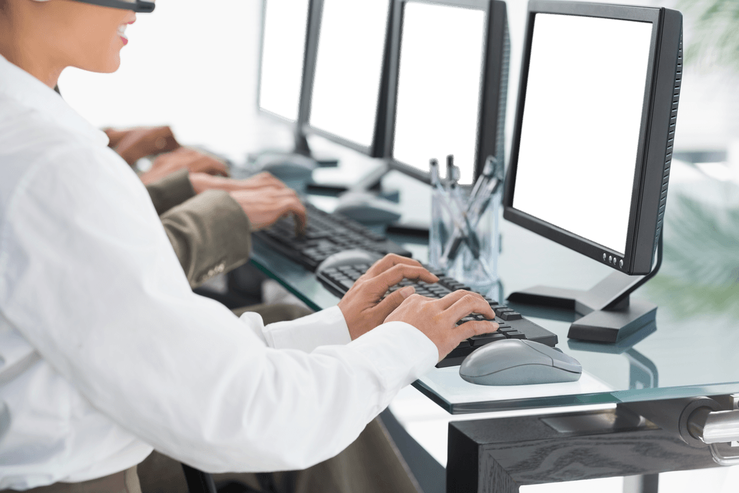 Transparent Computers on Modern Glass Office Desk