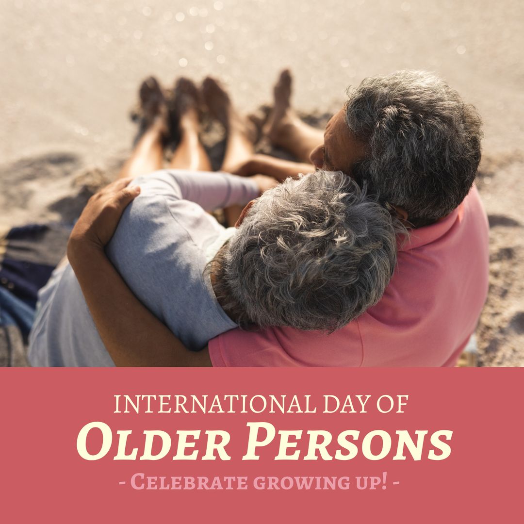 Senior Couple Embracing on Beach for International Day of Older Persons