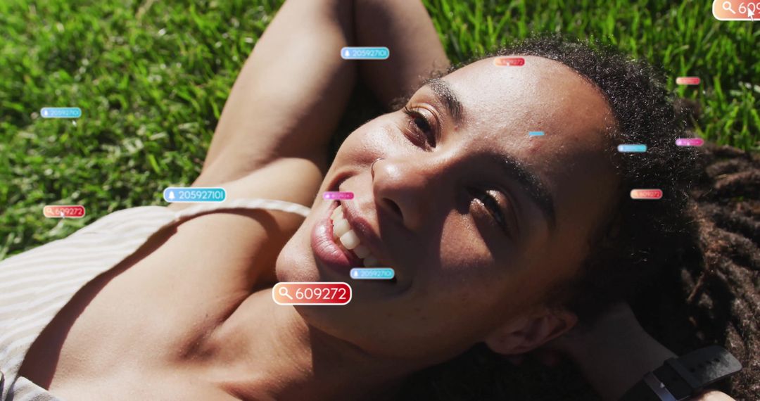 Woman Relaxing on Grass with Digital Interface Effects