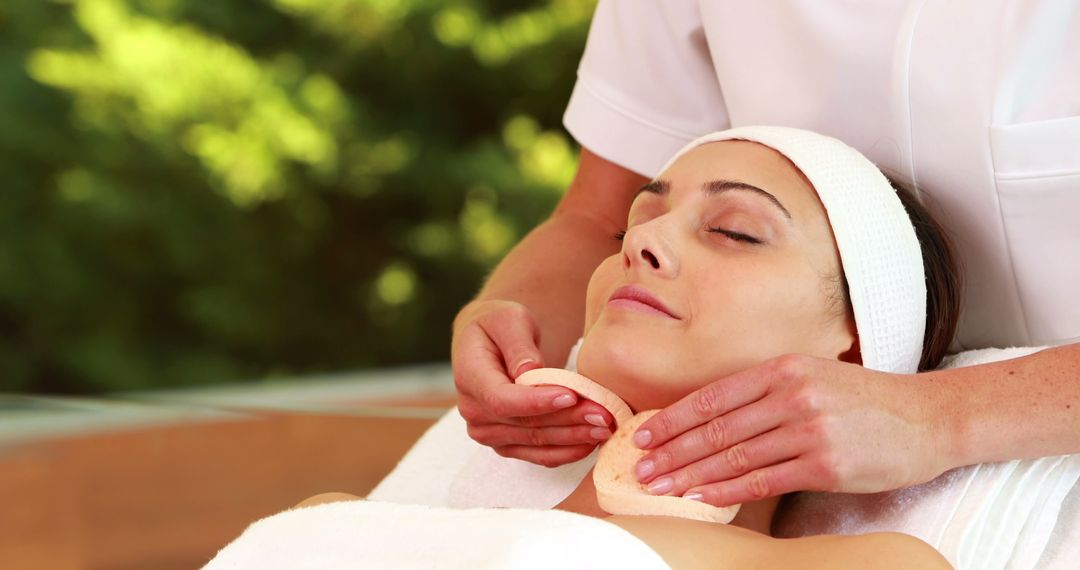 Woman Enjoying Facial Treatment in Spa Outdoors - Free Images, Stock Photos and Pictures on Pikwizard.com