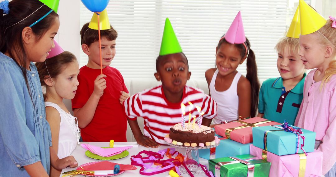 Excited Children Celebrating Birthday Party with Cake and Presents - Free Images, Stock Photos and Pictures on Pikwizard.com