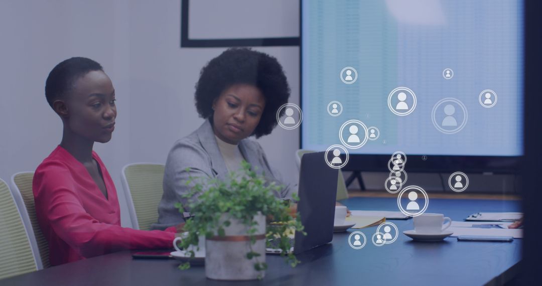 Diverse Team Analyzing Digital Data Network Interface in Modern Office