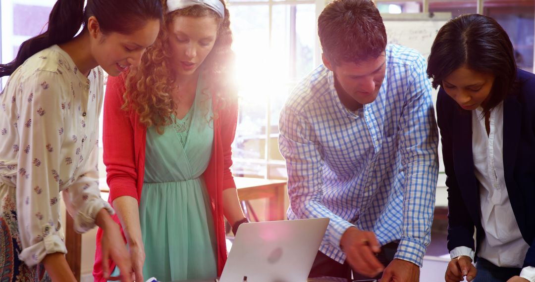 Diverse Team Collaborating in Bright Office on Creative Solutions