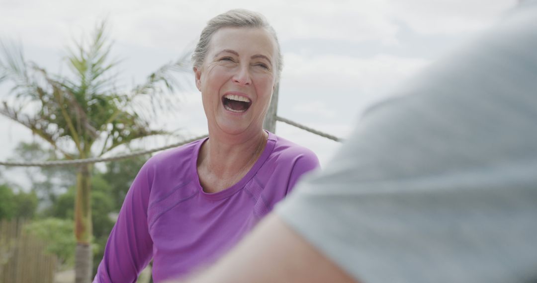 Smiling Active Elderly Woman Enjoying Outdoor Workout - Free Images, Stock Photos and Pictures on Pikwizard.com