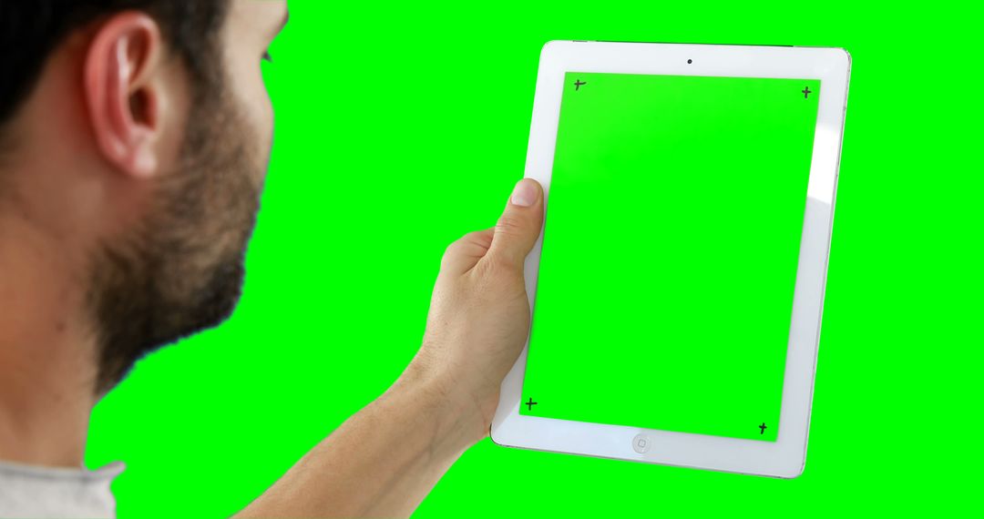 Person Using Tablet with Green Screen for Mockup - Free Images, Stock Photos and Pictures on Pikwizard.com