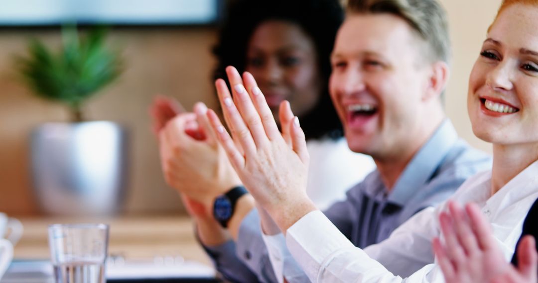 Diverse Team Applauding During Business Meeting - Free Images, Stock Photos and Pictures on Pikwizard.com