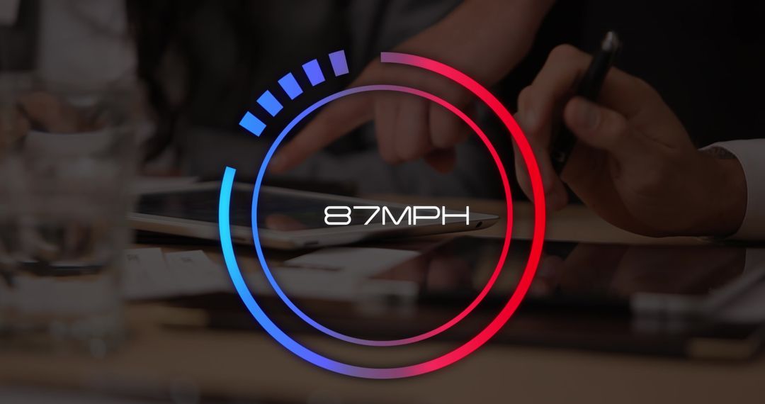 Business Team Analyzing Data with Digital Speedometer Overlay