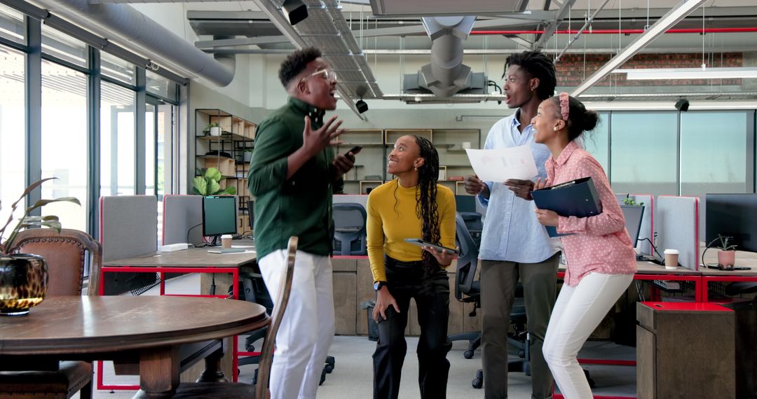 Diverse Team Collaborating in Modern Office Spaces