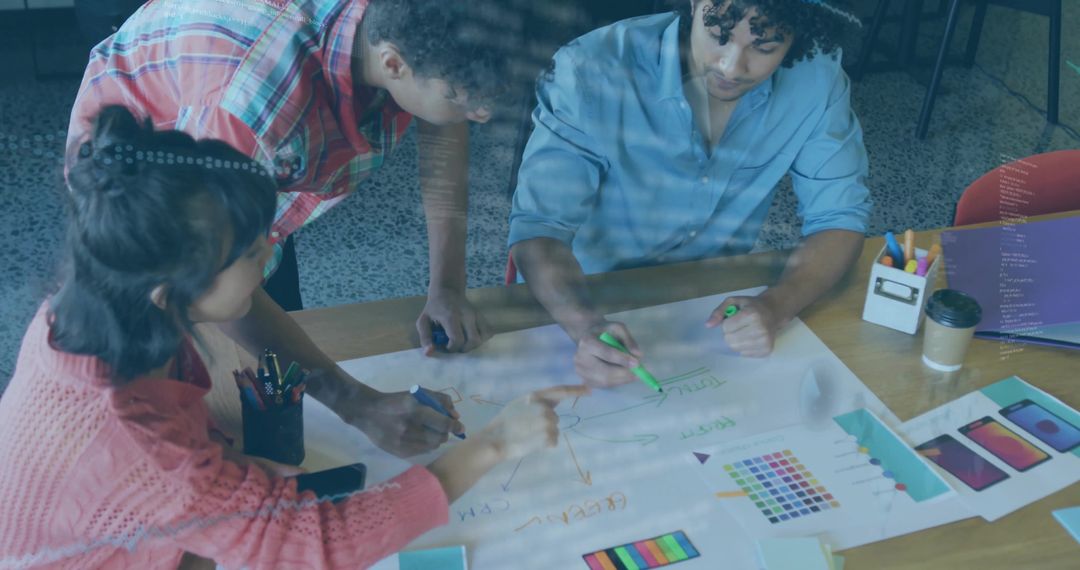 Creative Young Team Brainstorming Around Office Table