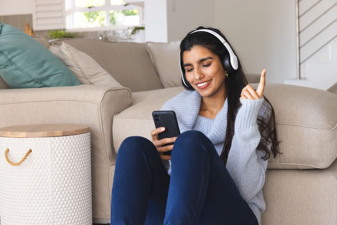 Woman Enjoying Music with Headphones Indoors