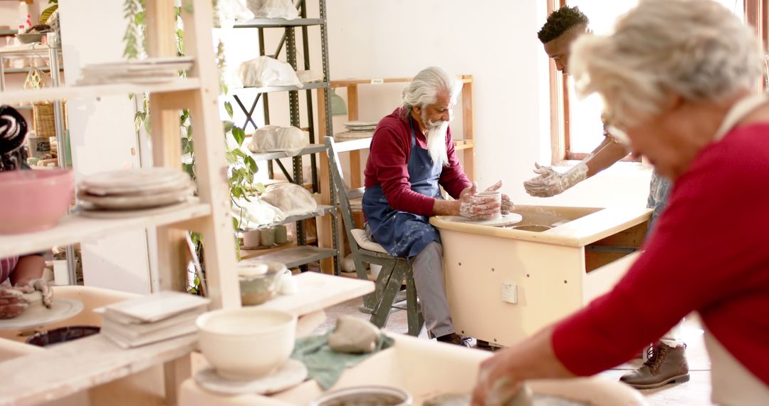 Elderly People Enjoy Hands-on Pottery Workshop - Free Images, Stock Photos and Pictures on Pikwizard.com