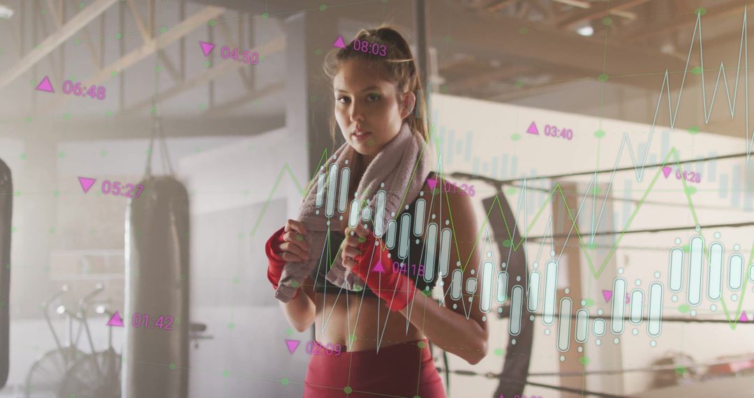 Woman Monitoring Fitness Performance with Technology in Boxing Gym