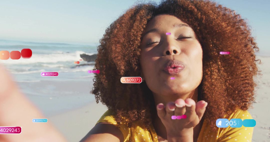 Woman on Beach Blowing Kiss with Social Media Icons Overlay