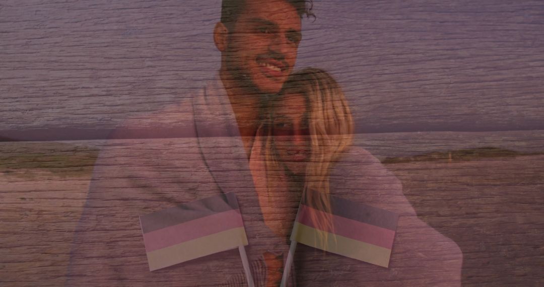 Romantic Couple Holding Flags at Twilight on Beach