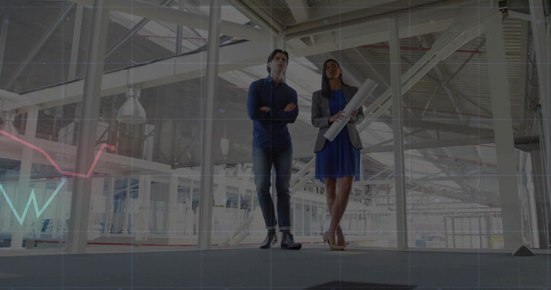 Architectural Professionals Walking in Modern Industrial Workspace